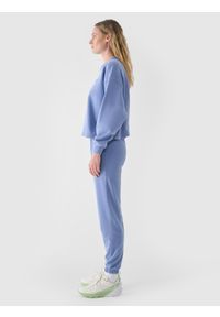 4f - 4F Spodnie dresowe joggery damskie - niebieskie XL. Kolor: niebieski. Materiał: dresówka. Wzór: gładki, ze splotem