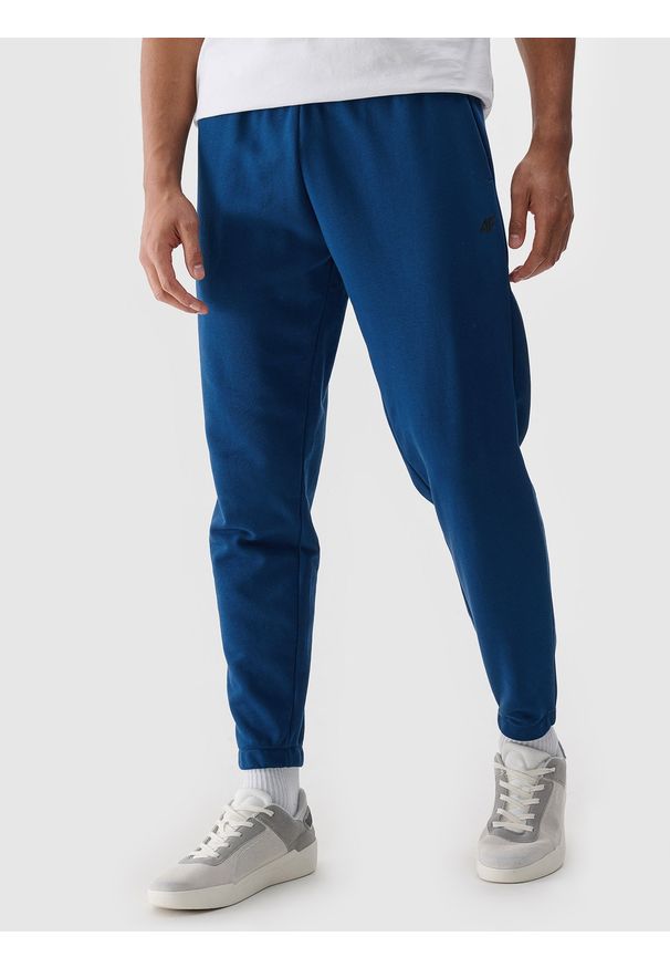 4f - 4F Spodnie dresowe joggery męskie - turkusowe M. Kolor: turkusowy. Materiał: dresówka. Wzór: gładki, ze splotem