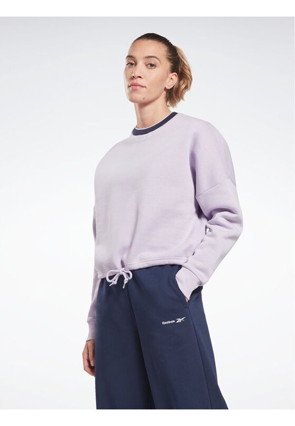 Reebok Bluza Identity HT6270 Fioletowy Relaxed Fit. Kolor: fioletowy. Materiał: syntetyk