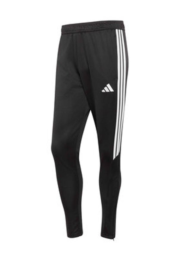 Adidas - adidas Spodnie dresowe Tiro 25 Essentials Training KG0809 Czarny Regular Fit. Kolor: czarny. Materiał: syntetyk