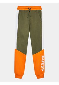 Guess Spodnie dresowe L3BQ11 KAX73 Khaki Relaxed Fit. Kolor: brązowy. Materiał: bawełna