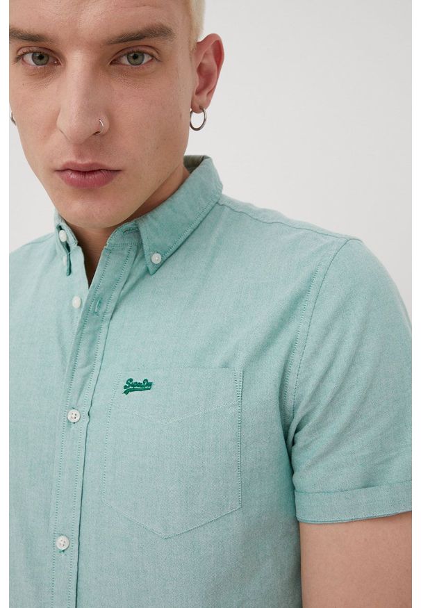 Superdry koszula bawełniana męska kolor zielony regular z kołnierzykiem button-down. Typ kołnierza: button down. Kolor: zielony. Materiał: bawełna. Długość rękawa: krótki rękaw. Długość: krótkie
