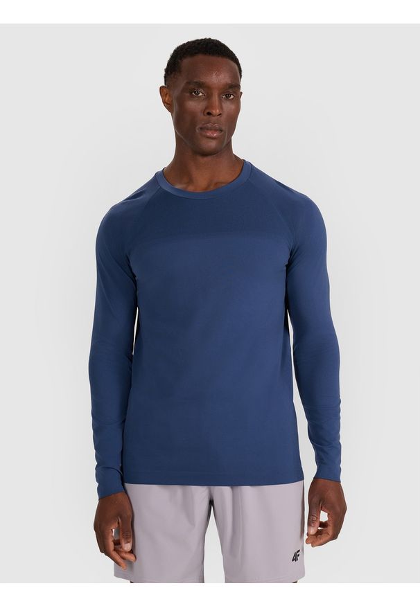 4f - 4F Longsleeve treningowy bezszwowy męski - granatowy L/XL. Kolor: niebieski. Materiał: materiał, włókno, skóra, syntetyk. Długość rękawa: długi rękaw. Długość: długie. Wzór: gładki, ze splotem. Sport: fitness