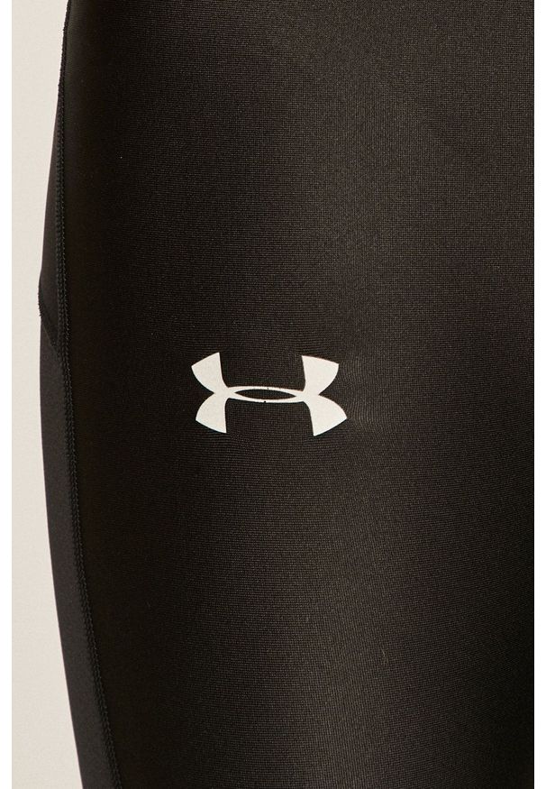 Under Armour - Spodnie. Kolor: czarny. Materiał: materiał, skóra, tkanina. Wzór: gładki