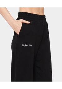 Szerokie spodnie dresowe dla kobiet Carpatree Sports Club. Kolor: czarny. Materiał: dresówka