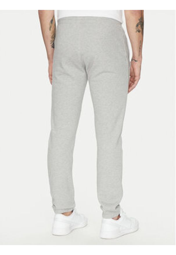 Adidas - adidas Spodnie dresowe Trefoil Essentials JD2424 Szary Slim Fit. Kolor: szary. Materiał: bawełna