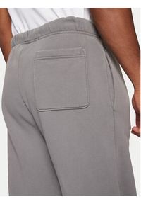 Hugo - HUGO Spodnie dresowe Dopee 50540938 Szary Regular Fit. Kolor: szary. Materiał: bawełna