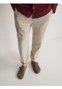 Reserved - Spodnie joggery z lnem - beżowy. Kolor: beżowy. Materiał: len #1