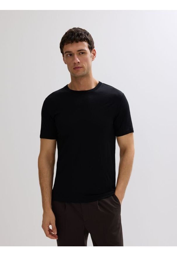 Reserved - T-shirt slim z wełny merino - czarny. Kolor: czarny. Materiał: wełna