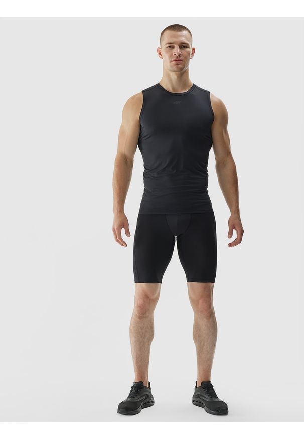 4f - 4F Spodenki treningowe slim szybkoschnące męskie - czarne 3XL. Kolor: czarny. Materiał: dzianina, elastan, włókno, materiał, poliester. Wzór: gładki, jednolity, ze splotem. Sport: fitness