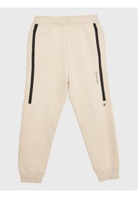 Calvin Klein Jeans Spodnie dresowe Seaming Skater IB0IB01506 Beżowy Regular Fit. Kolor: beżowy. Materiał: syntetyk