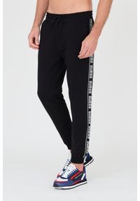 Guess - GUESS Czarne męskie spodnie dresowe, Rozmiar S. Kolor: czarny. Materiał: dresówka #4