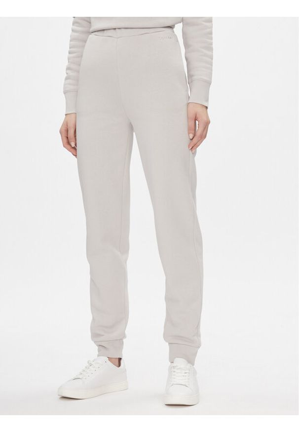 Calvin Klein Spodnie dresowe Metallic Micro Logo Jogger K20K206965 Beżowy Regular Fit. Kolor: beżowy. Materiał: bawełna