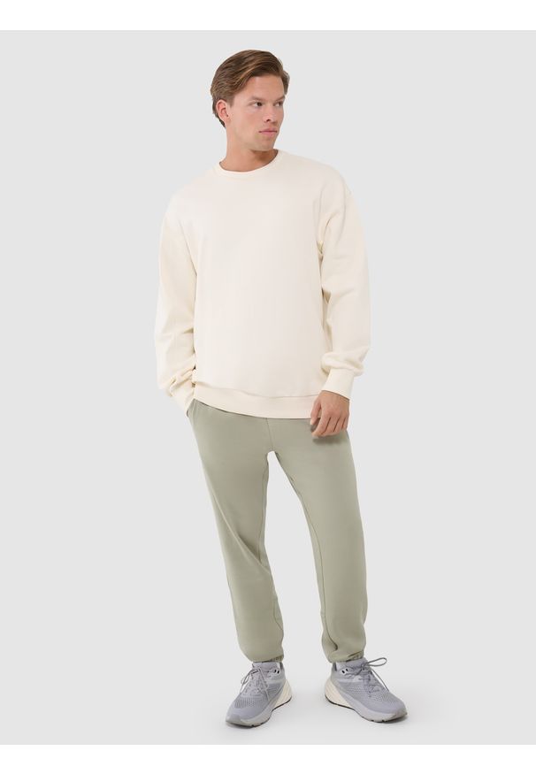 4f - 4F Bluza dresowa oversize nierozpinana bez kaptura męska - beżowa XL. Okazja: na co dzień. Typ kołnierza: bez kaptura. Kolor: beżowy. Materiał: dresówka. Styl: klasyczny, sportowy, casual