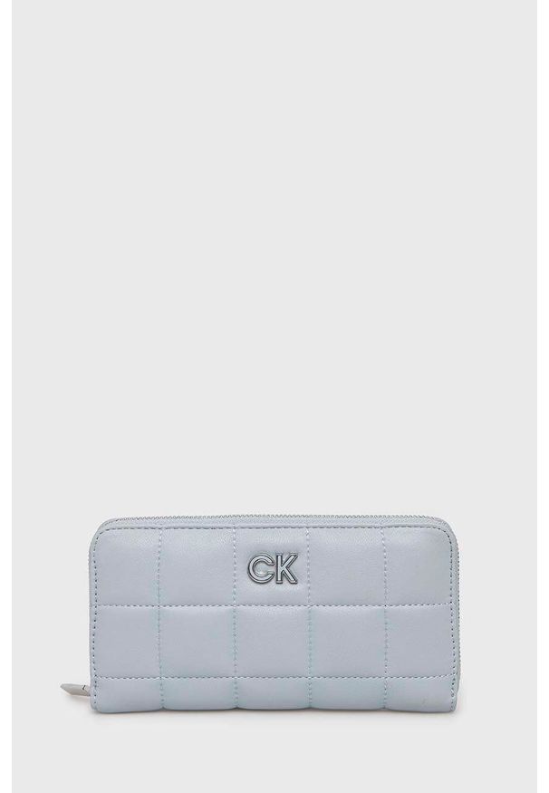 Calvin Klein portfel damski kolor niebieski. Kolor: niebieski. Materiał: materiał. Wzór: gładki