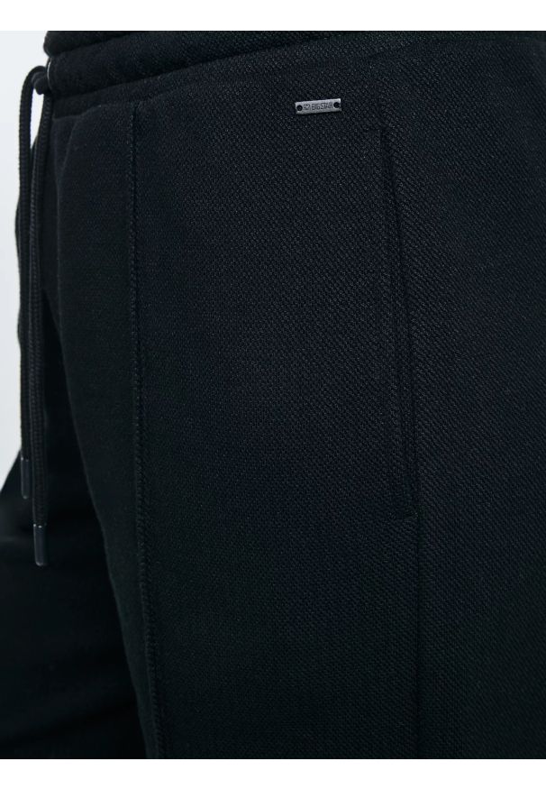 Big-Star - Spodnie damskie dresowe z przeszyciem czarne Pixelinap 906. Kolor: czarny. Materiał: dresówka. Styl: elegancki