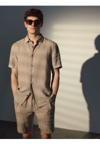 Reserved - Lniane szorty jogger - beżowy. Kolor: beżowy. Materiał: len