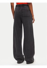 Hugo - HUGO Spodnie dresowe Nolasa_B 50545019 Czarny Loose Fit. Kolor: czarny. Materiał: bawełna