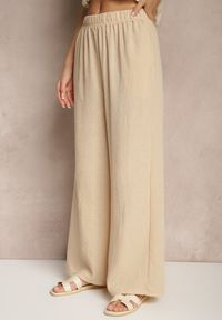 Renee - Beżowe Spodnie Palazzo o Szerokim Kroju High Waist Ollevia. Okazja: na co dzień, na spotkanie biznesowe. Stan: podwyższony. Kolor: beżowy. Materiał: jedwab. Wzór: aplikacja. Styl: biznesowy, elegancki, casual #3