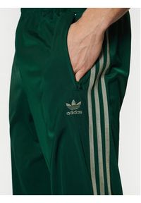 Adidas - adidas Spodnie dresowe adicolor Classics Firebird JP2539 Zielony Regular Fit. Kolor: zielony. Materiał: syntetyk #3