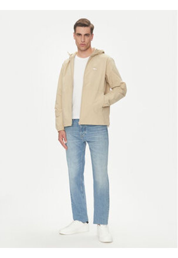 Tommy Jeans Wiatrówka Chicago DM0DM21393 Beżowy Regular Fit. Kolor: beżowy. Materiał: syntetyk