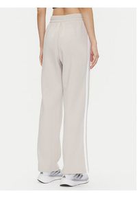Adidas - adidas Spodnie dresowe Essentials 3-Stripes JW9215 Beżowy Regular Fit. Kolor: beżowy. Materiał: syntetyk, bawełna #3