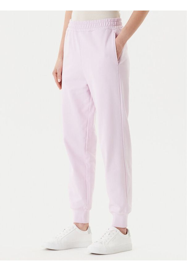 United Colors of Benetton - United Colors Of Benetton Spodnie dresowe 3UNIDF01A Różowy Regular Fit. Kolor: różowy. Materiał: bawełna