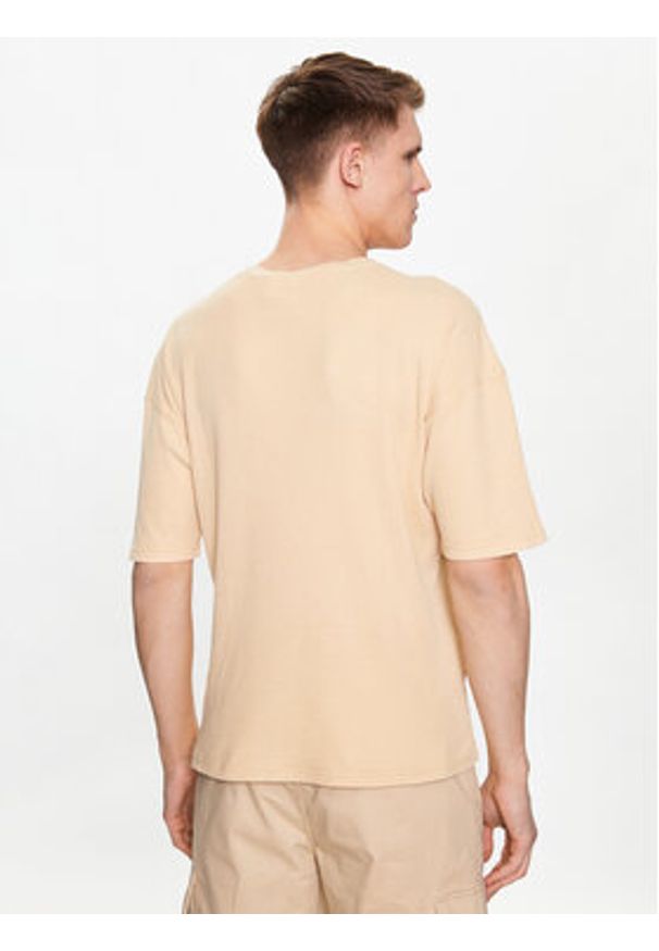 Champion T-Shirt 218647 Beżowy Regular Fit. Kolor: beżowy. Materiał: bawełna, syntetyk
