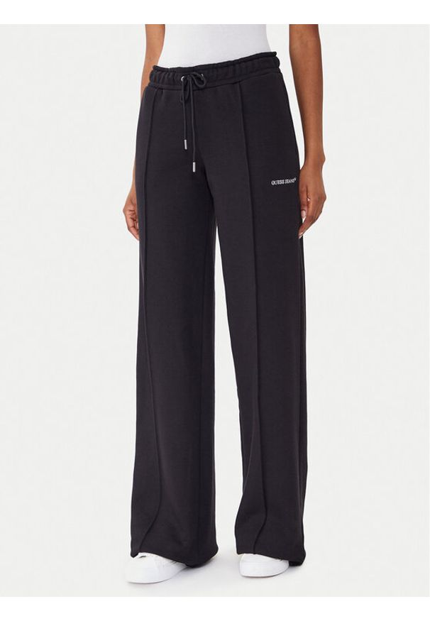 Guess Jeans Spodnie dresowe W5BB04 KC811 Czarny Wide Leg. Kolor: czarny. Materiał: bawełna