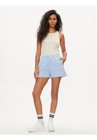 Tommy Jeans Szorty sportowe New Cls DW0DW17772 Błękitny Relaxed Fit. Kolor: niebieski. Materiał: bawełna