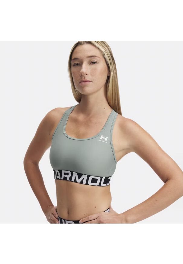 Stanik sportowy Under Armour HeatGear Authentics Mid Branded Bra. Kolor: zielony. Sport: fitness
