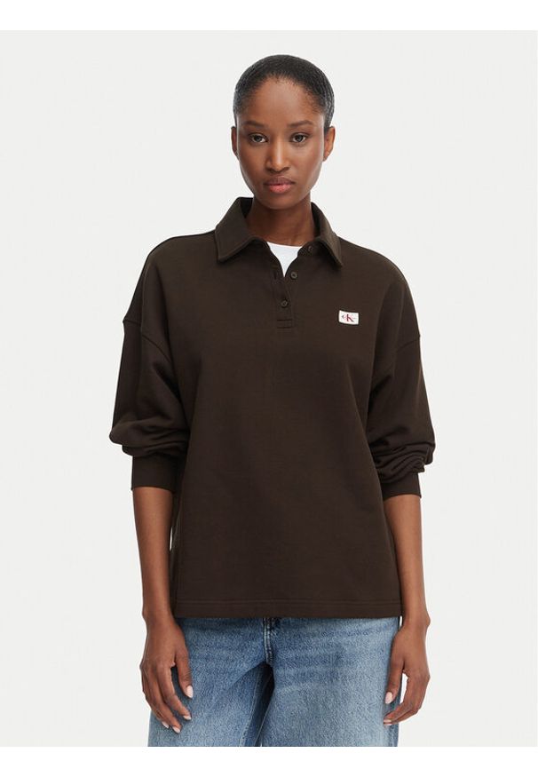 Calvin Klein Jeans Polo LV047G230G Brązowy ciemny Relaxed Fit. Typ kołnierza: polo. Kolor: brązowy. Materiał: bawełna