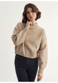Ochnik - Beżowy sweter damski z cekinami. Kolor: beżowy. Materiał: akryl. Wzór: aplikacja, kwiaty