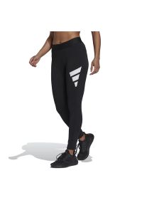 Adidas - Legginsy adidas Sportswear Future Icons GU9696 - czarne. Kolor: czarny. Materiał: elastan, bawełna, poliester, materiał. Wzór: aplikacja. Sport: fitness