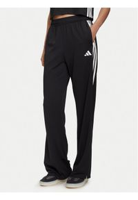 Adidas - adidas Spodnie dresowe Tiro Cut 3-Stripes Mesh JG4103 Czarny Loose Fit. Kolor: czarny. Materiał: syntetyk #1
