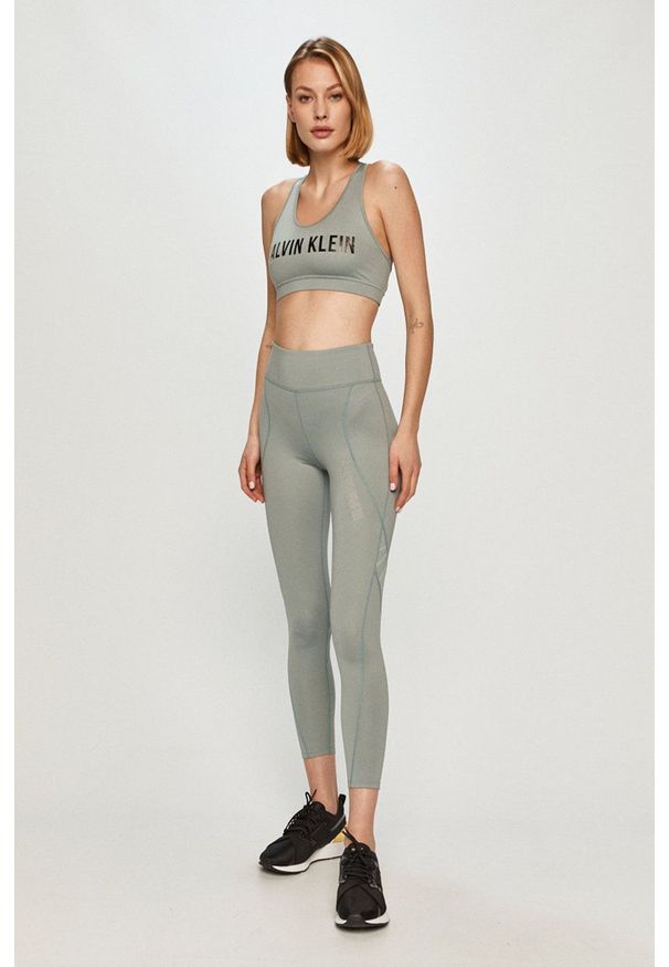 Calvin Klein Performance - Biustonosz sportowy. Kolor: zielony. Rodzaj stanika: odpinane ramiączka. Wzór: nadruk