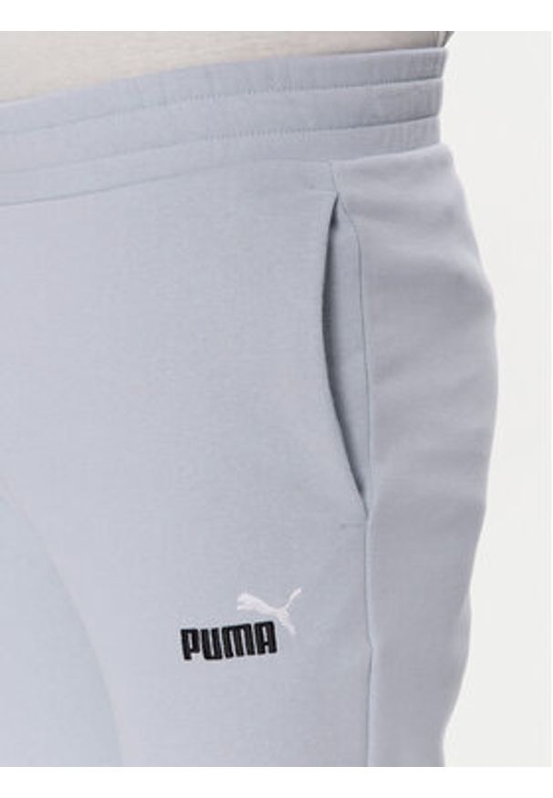 Puma Spodnie dresowe Ess 684714 Fioletowy Regular Fit. Kolor: fioletowy. Materiał: bawełna