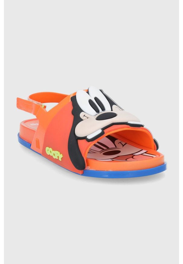 melissa - Melissa sandały dziecięce Beach Slide x Disney kolor pomarańczowy. Zapięcie: rzepy. Kolor: pomarańczowy. Materiał: kauczuk, guma, materiał. Wzór: motyw z bajki