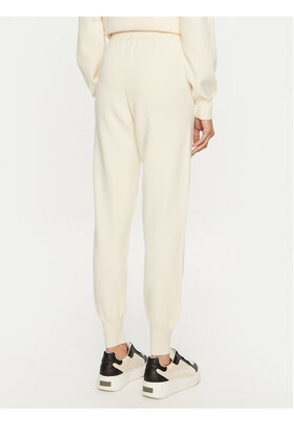 Replay - REPLAY Spodnie dresowe DK3302.000.G23372 Écru Regular Fit. Materiał: syntetyk