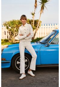 MOODO - Jeansy bootcut kremowe. Kolor: kremowy