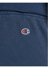 Champion Spodnie dresowe 217896 Granatowy Regular Fit. Kolor: niebieski. Materiał: dresówka, bawełna