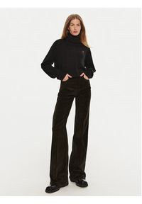 AMI PARIS - AMI Paris Spodnie materiałowe FTR420.CO0089 Brązowy Flare Fit. Kolor: brązowy. Materiał: bawełna