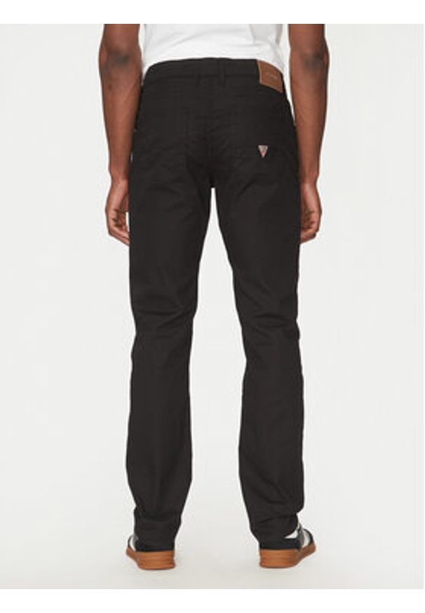 Guess Spodnie materiałowe M5RAS2 WGXW1 Czarny Slim Fit. Kolor: czarny. Materiał: syntetyk