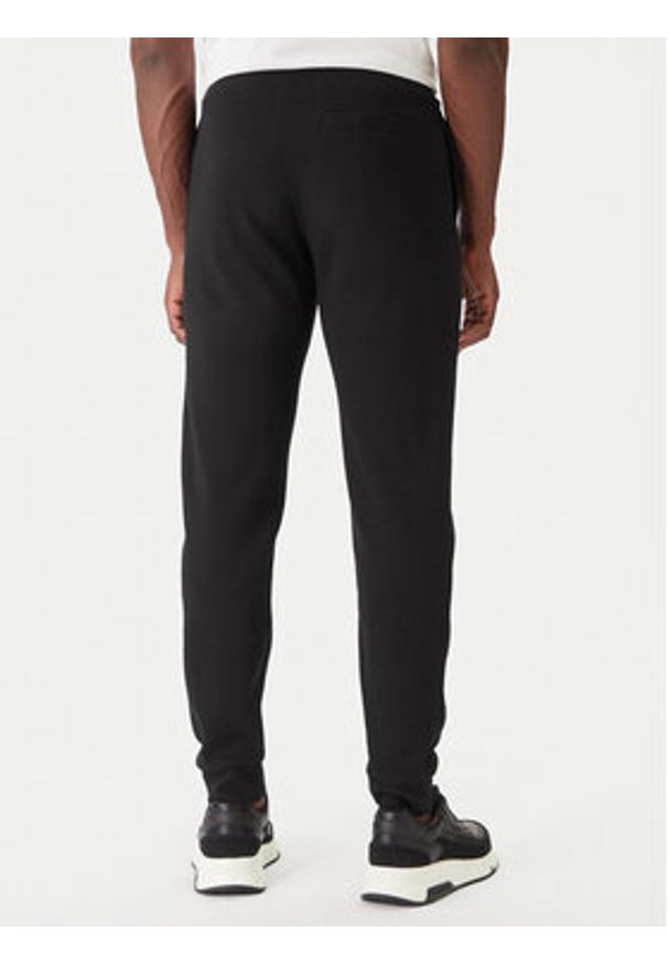 Nautica Spodnie dresowe Nampa N1T04063 Czarny Regular Fit. Kolor: czarny. Materiał: syntetyk