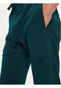 Adidas - adidas Spodnie dresowe ALL SZN Fleece JX5096 Zielony Tapered Leg. Kolor: zielony. Materiał: bawełna #5
