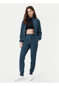 Guess Spodnie dresowe V2YB18 K7UW2 Niebieski Regular Fit. Kolor: niebieski. Materiał: wiskoza #4