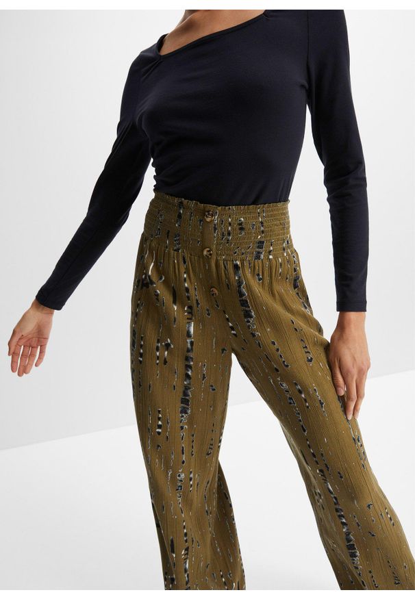 bonprix - Spodnie palazzo z lejącej wiskozy. Kolor: zielony. Materiał: wiskoza. Wzór: nadruk