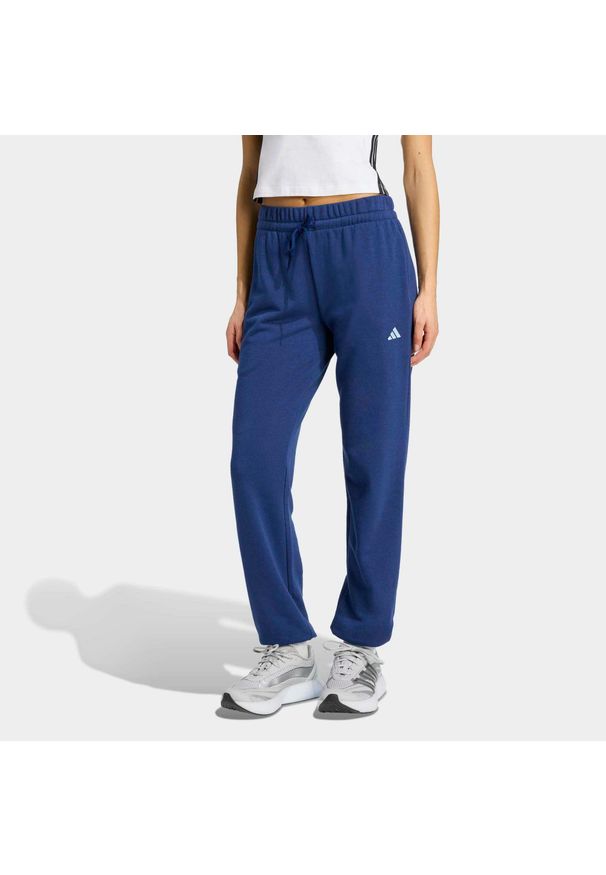 Adidas - Spodnie fitness damskie ADIDAS. Kolor: niebieski. Materiał: dresówka, materiał. Sport: fitness