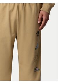 The North Face Spodnie dresowe Unisex Mountain Cleanup NF0A8C2W Beżowy Relaxed Fit. Kolor: beżowy. Materiał: bawełna #5