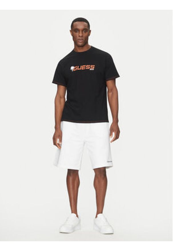 Guess T-Shirt F5GI06 I3Z14 Czarny Regular Fit. Kolor: czarny. Materiał: bawełna
